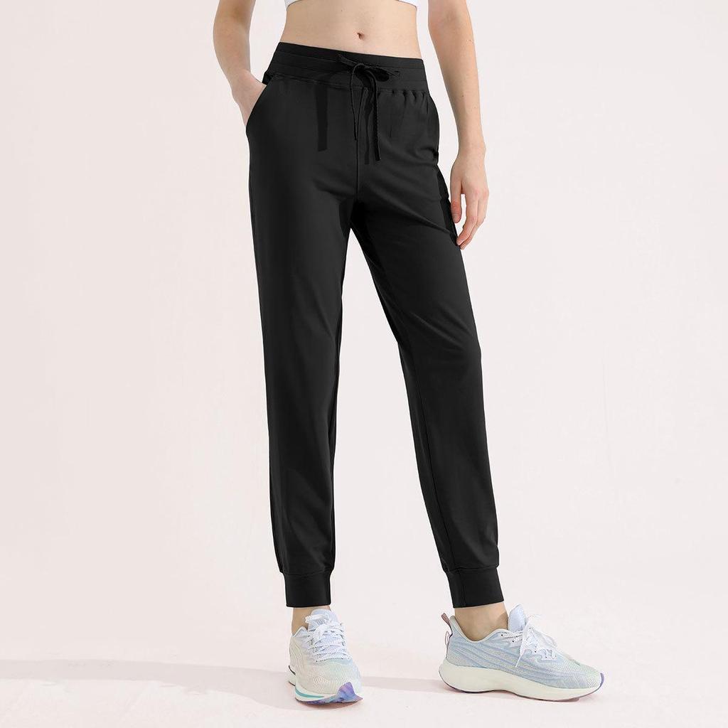 Women's Green Drawstring Quick-Dry Sports Pants: Lightweight, High-End, Straight-Leg Design for Summer.