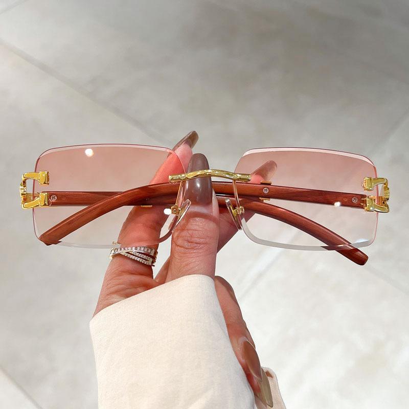 

Luxury Brand Design Vintage Rimless Sunglasses Women For Men 2023 Fashion Trendy Leopard head Frame Gradient Sun Glasses UV400 As The Picture розовый