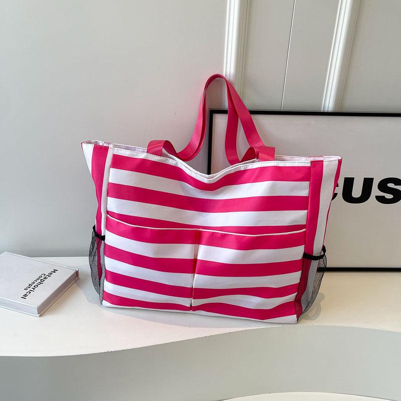 

2025 spring and summer new bag women s bag Korean version of foreign style niche design casual single shoulder European and American college style рожевий червоний колір