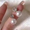 Pendientes de perlas de alta gama de moda Pendientes retro de nicho francés de lujo ligero Pendientes de perlas simples y versátiles para mujer