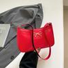 Fashion bow 2025 solid color new Korean version trendy texture foreign style commuting single shoulder underarm baguette bag women
