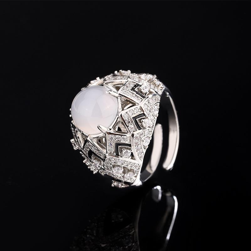 

Hao inlaid with diamond temperament yuan shape imitation royal blue red corundum zircon chalcedony ring drop glaze open ring female