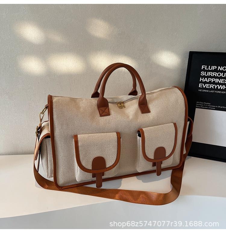 

Large capacity business trip travel bag women s bag 2025 new casual canvas bag men s and women s gym bag crossbody handbag trend коричневый