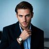 Men's waterproof and rainproof wristwatch with a round dial, quartz movement, numeral dial, blue strap, and black case. A simple accessory perfect
