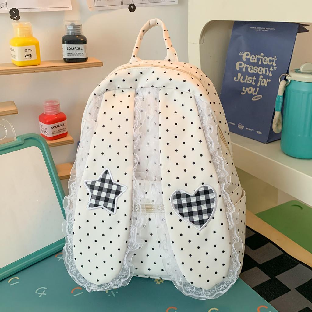 Schoolbag Korean simple foreign style polka dot love rabbit ear backpack 1011 summer new commuter student backpack