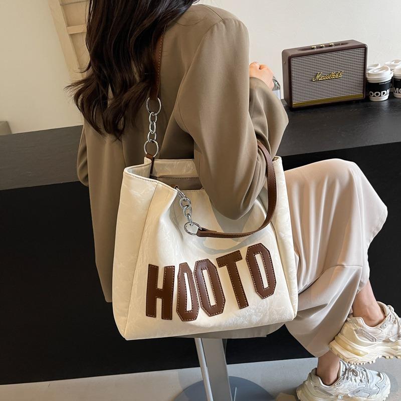 College students take classes, shoulder spring and summer bags, women's large-capacity new high-end textured commuter portable tote bags