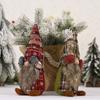 Christmas Tabletop Playful Decor Featuring Eyecovered Faceless Doll With Gloves