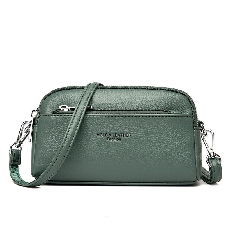 Hand-held small shell bag trendy girl portable hand-held change bag double-layer leather single shoulder oblique span women's bag