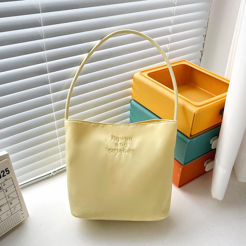2025 Summer New Simple Nylon Underarm Bag Niche Design Letter Embroidery Portable Bucket Bag