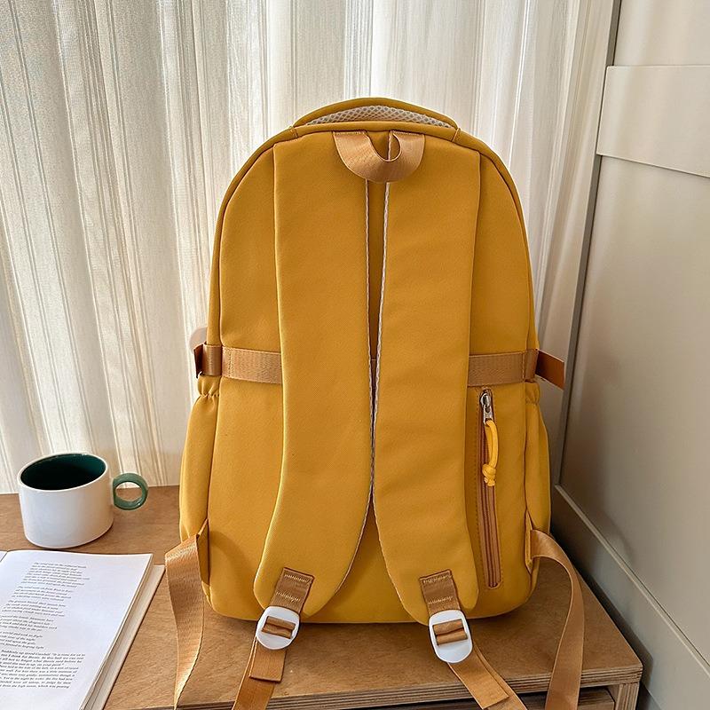 The new schoolbag is high-value, fresh and sweet, candy-colored backpack, lightweight and large-capacity backpack for junior high school students.