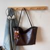 Bag women's new soft leather tote bag large capacity women's niche high-end sense of commuting to work portable shoulder bag