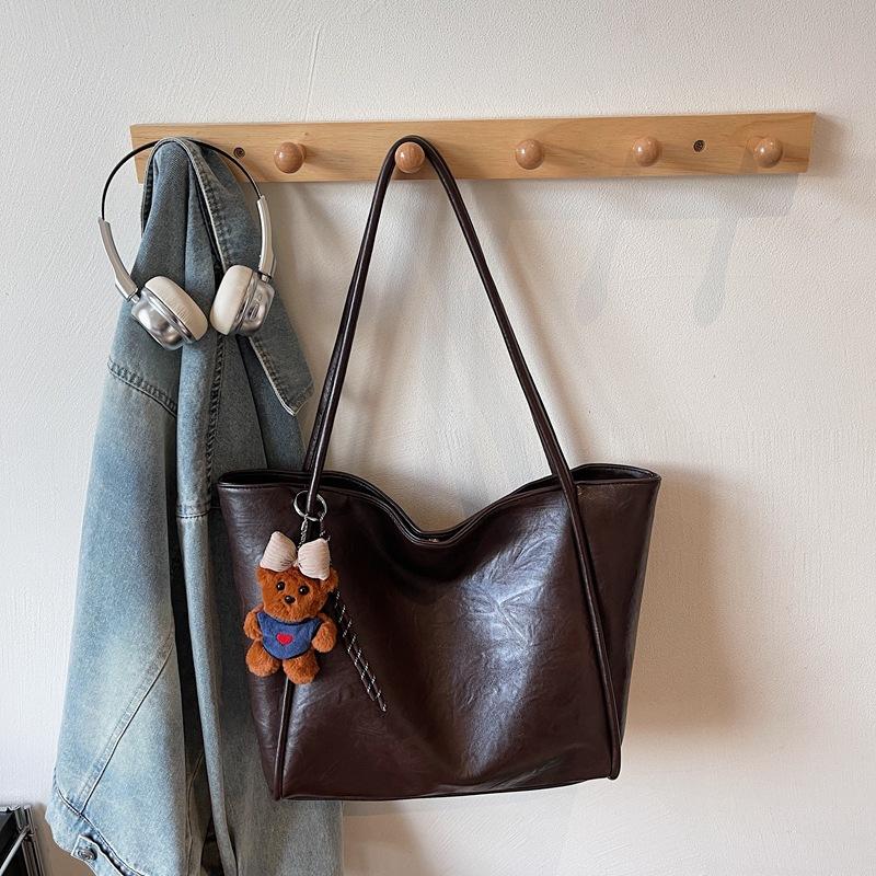 Bag women's new soft leather tote bag large capacity women's niche high-end sense of commuting to work portable shoulder bag