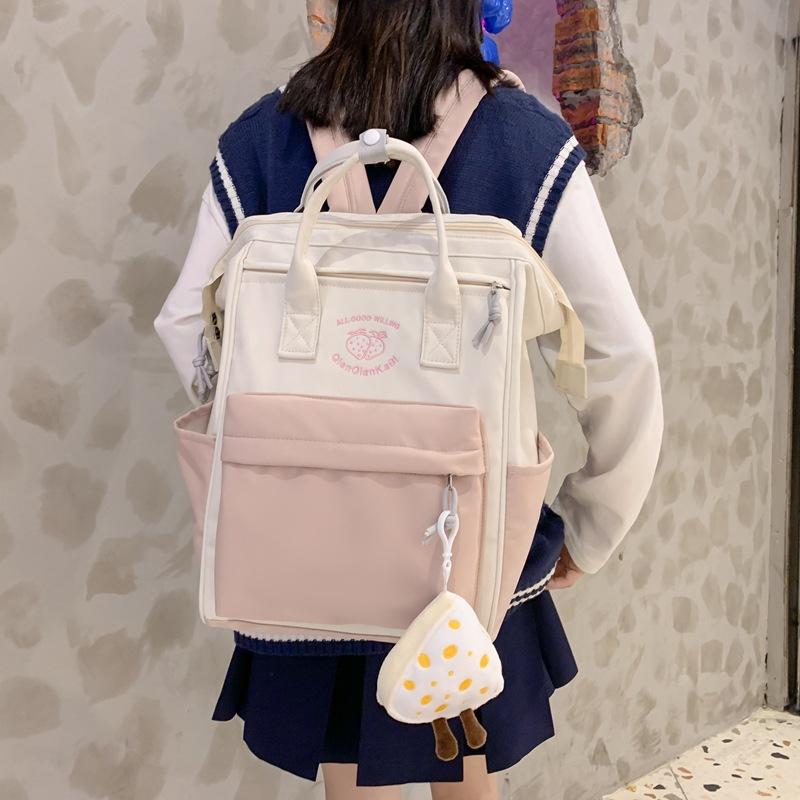 

Printed clip model, portable Harajuku student schoolbag, new backpack for junior high school students with pendant розовый