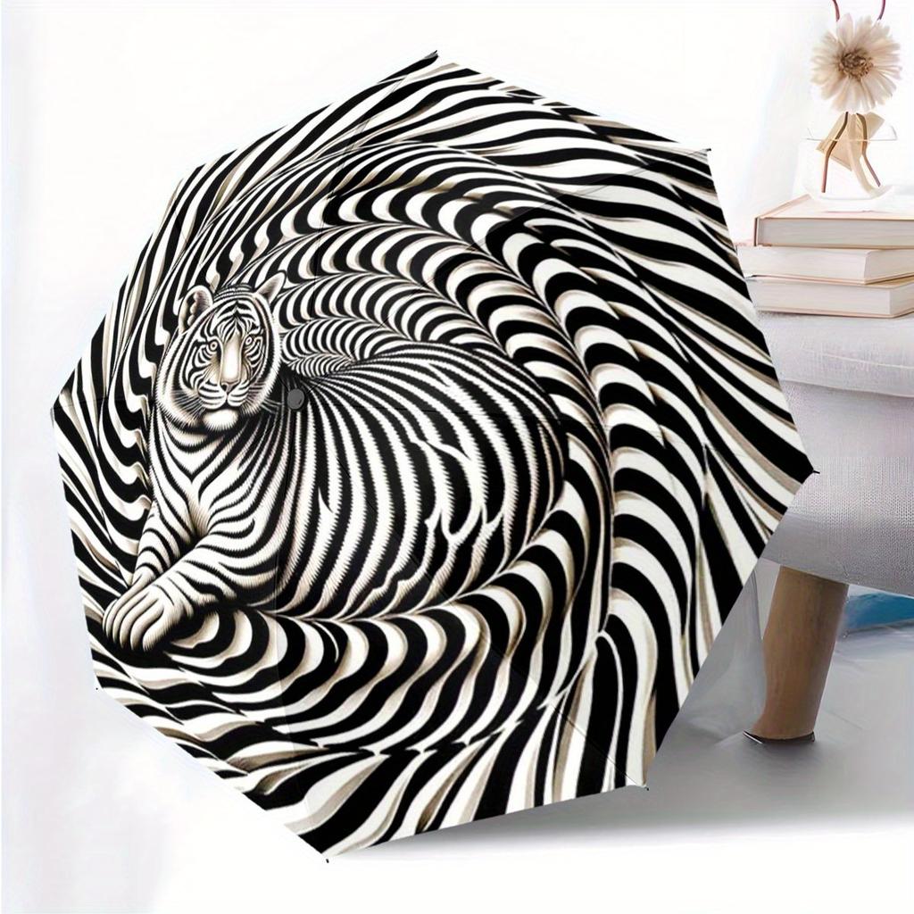 This Compact Umbrella Showcases a Striking Black And White Optical Illusion Design, Highlighted by a Large White Tiger in The