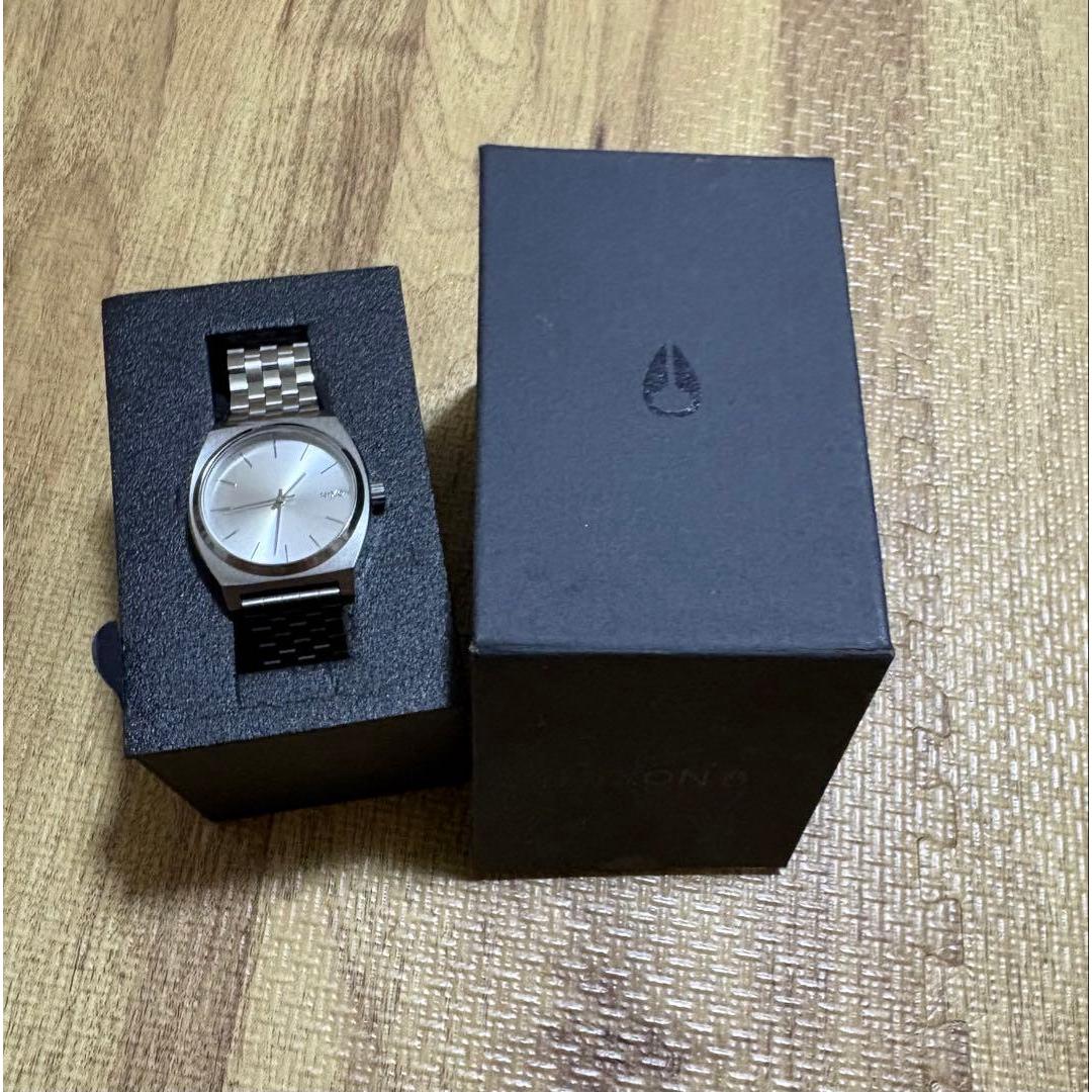 Used NIXON watch body silver color