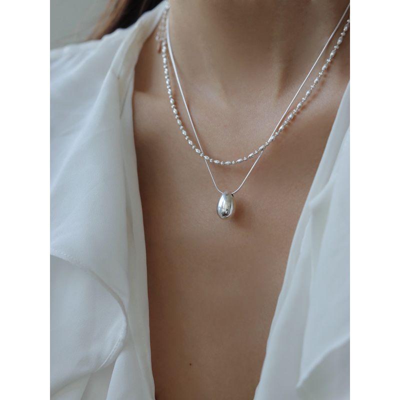 European and American-Style Premium Elegant Minimalist Sweater Chain Designer Small Silver Egg