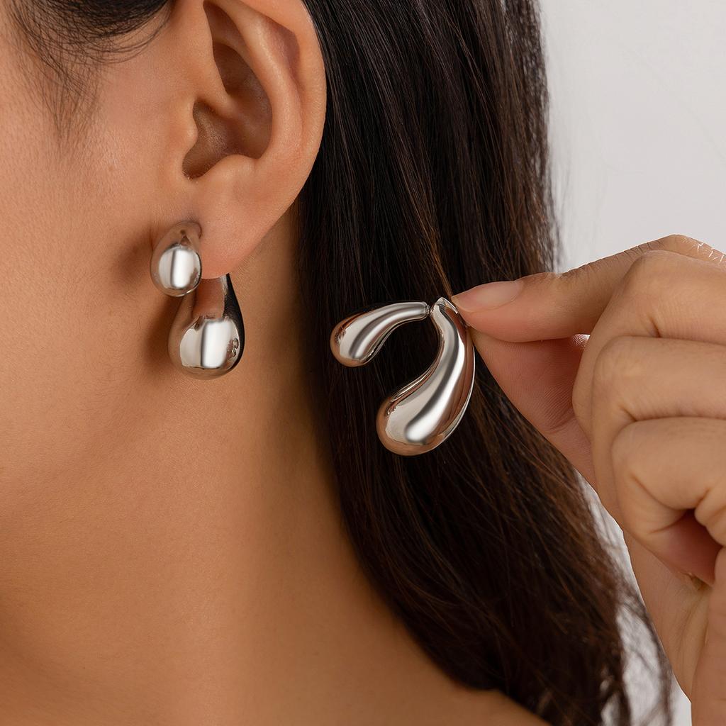 Street shots ins geometric metal earrings earrings design glossy surface comma water drop stud earrings female