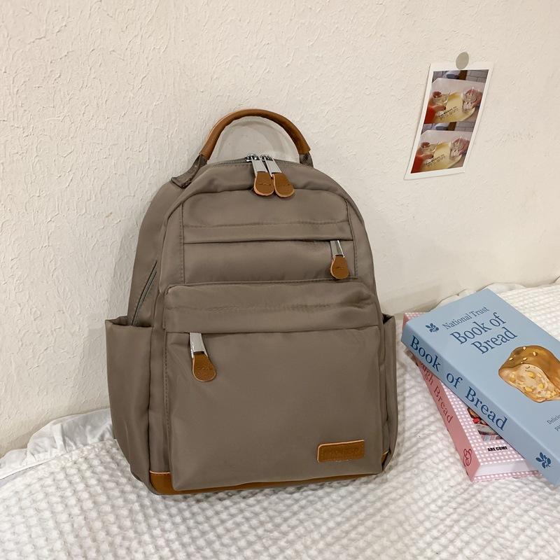 

Школьный рюкзак высокая ценность инс стиль простой досуг путешествия легкий рюкзак корейская версия универсальный школьный рюкзак студент колледжа милый рюкзак серый