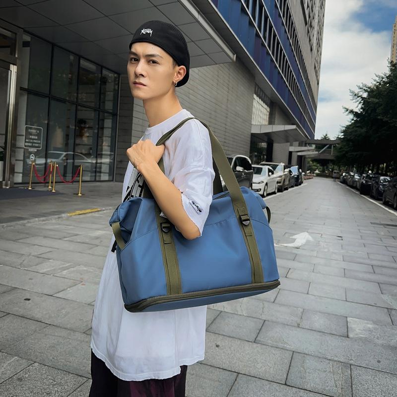 Large capacity storage men's new portable versatile trendy crossbody sports bag fashionable short distance light travel bag