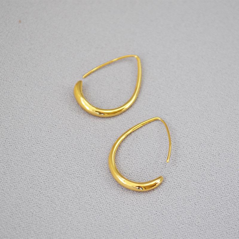 

Minimalist Korean Water Drop Hoop Earrings - Versatile, Cold Style Ear Jewelry for Women to Enhance Face Shape. золотий
