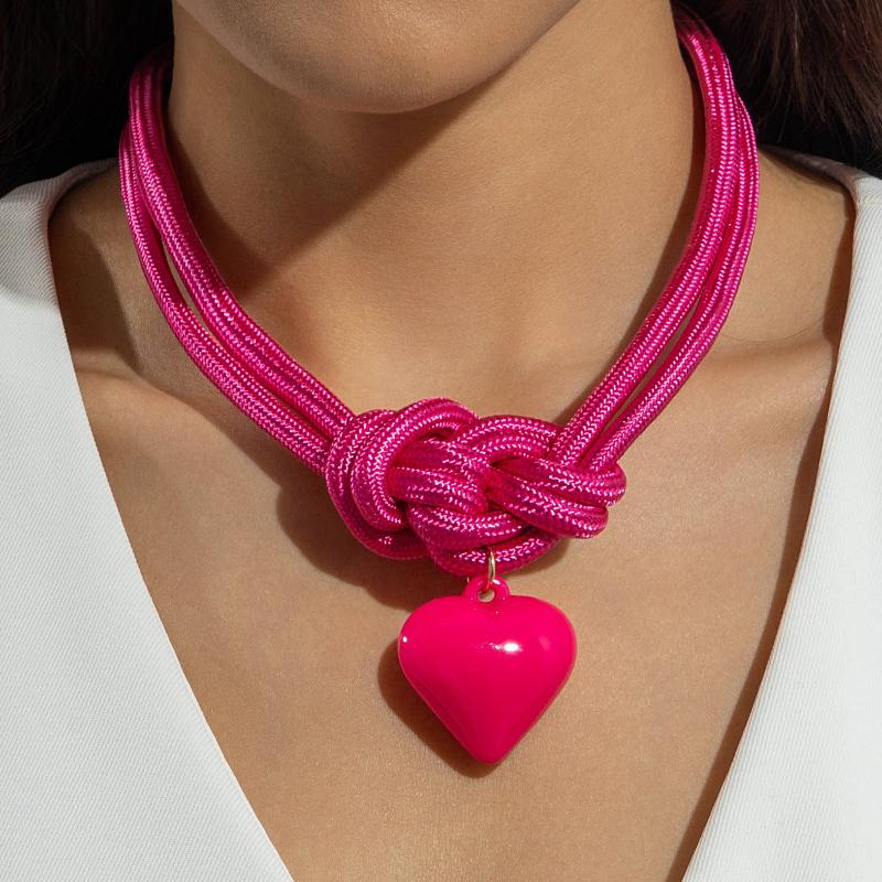 A Unique Knotted Design Necklace With Leaves Starfish And Scallops A Simple Drawstring Pendant Necklace With A Bow And Pearls