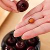 Small-Size Fruit Pitter for Baking Tasks, Manual 7 Slot Press Tool with ABS and PC Body, Metal Prongs, Drawer Storage, and Counter Duty
