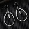 Retro Christmas Tree Hollow Water Drop Earrings - Fashionable High-End Women's Gift