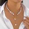 Stacked pearl necklace collection European and American retro baroque special-shaped pearl OT buckle blade snake chain tassel