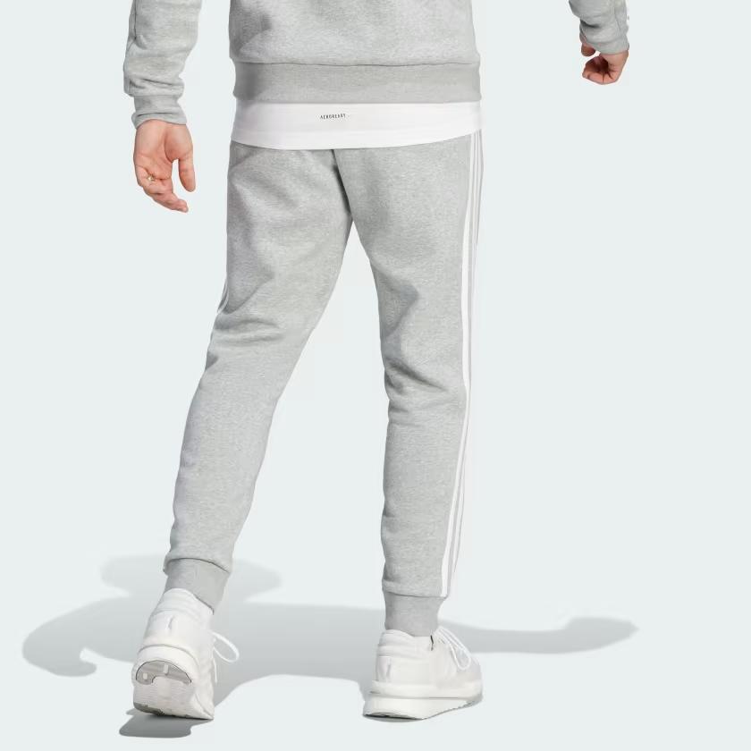 Adidas Essentials Fleece 3-Stripes Kalhoty se zúženými manžetami Středně šedý melír Pánské Streetwear IJ6494