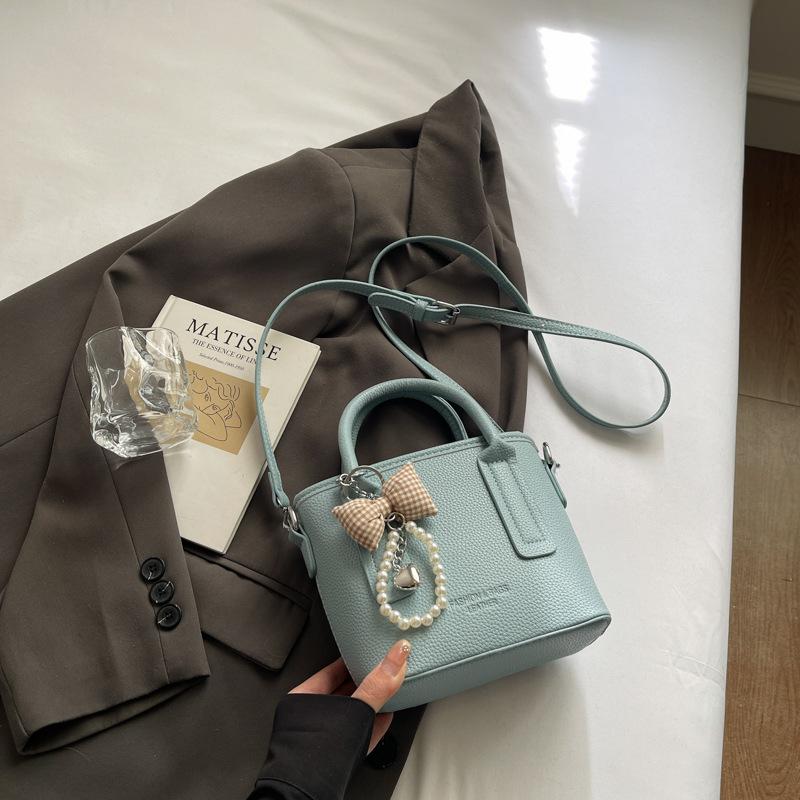 Autumn and winter new small bag women's premium texture portable bucket bag versatile retro commuter messenger bag