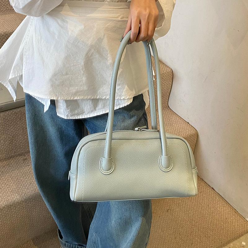 Fashion baguette bag 2025 new simple texture hand-held underarm bag high-end niche commuter shoulder bag women's bag