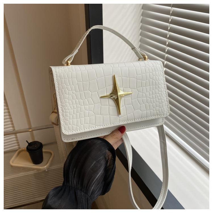 

Textured small bag 2024 summer new clamshell crocodile pattern shoulder bag Xingmang niche design messenger bag women білий