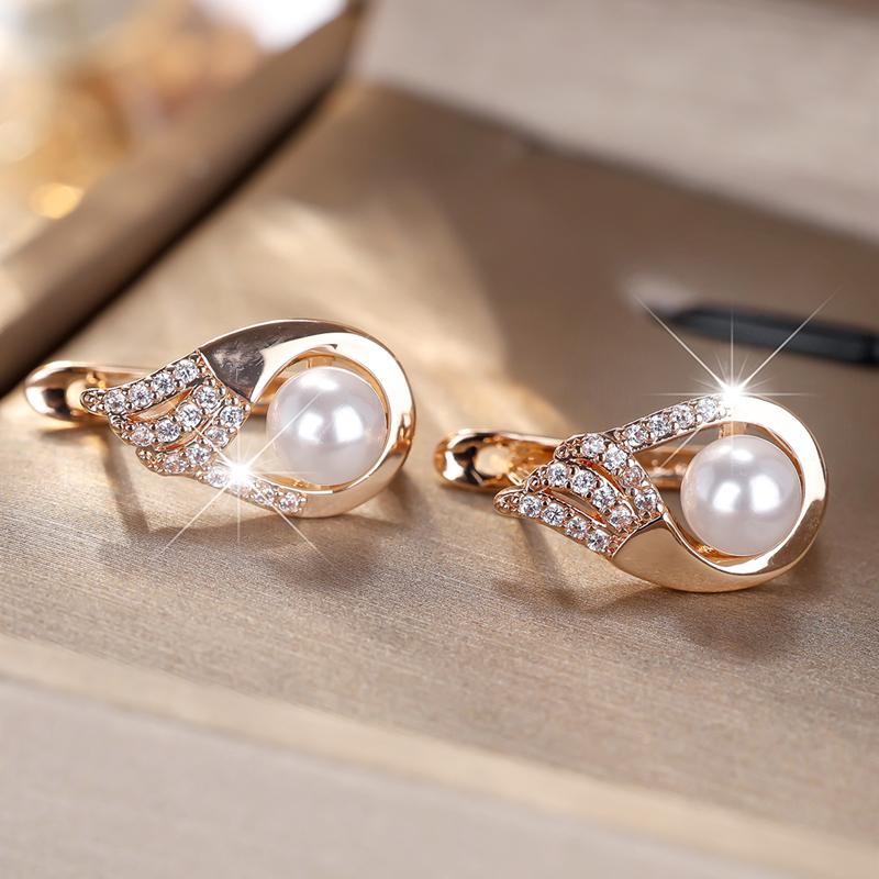 Elegant Feather and Faux Pearl Drop Earrings for Women, Luxurious Angel Wing Earrings… More
