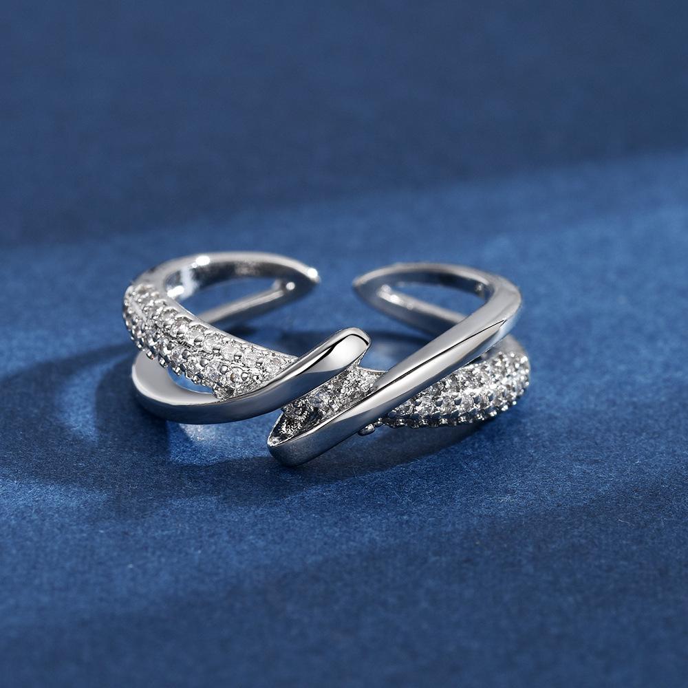 Geometric Criss-Cross Wrap Ring: Women's Elegant Cold-Style Design.