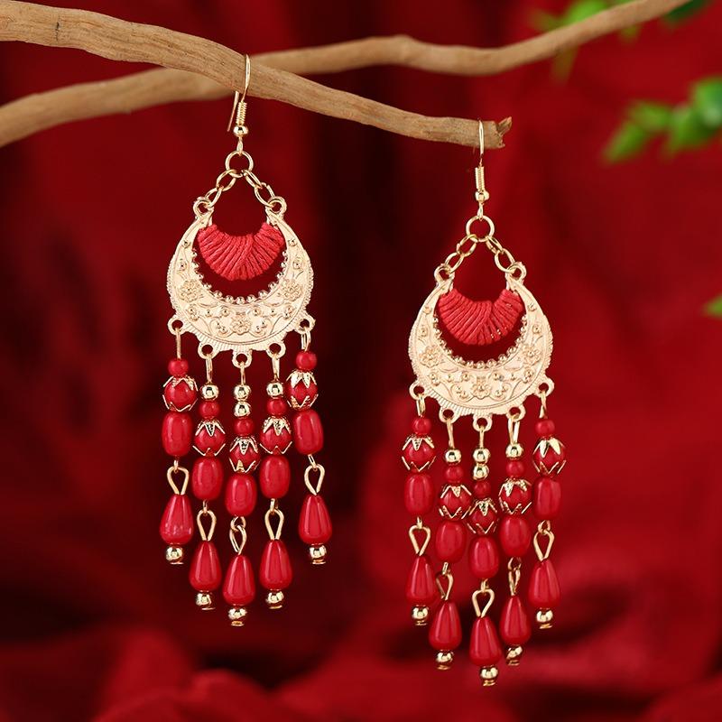 

Богемные зеленые серьги с бахромой женские ретро длинные серьги с темпераментом отпуск в Юньнани нишевые серьги