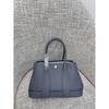 Borsa da giardino cucita a mano con filo cerato, ferramenta interamente in acciaio, borsa da donna portatile in pelle bovina primo strato con motivo a collo di mucca Ntogo