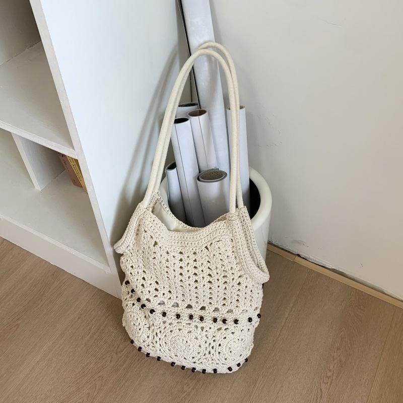 Fashion hollow crochet pocket new holiday style beach shoulder messenger bag