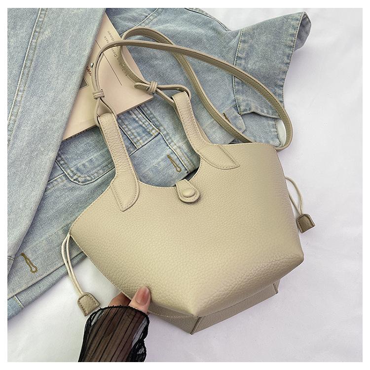 2025 New Versatile Niche Design Vegetable Basket Women's Bag High-end Texture Commuter Portable Messenger Bag Women's Trend