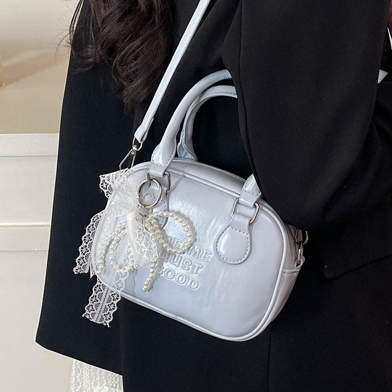 Spring and Summer Popular Korean Niche High-end Portable Bowling Bag Casual Versatile Temperament Foreign Style Messenger Women's Bag