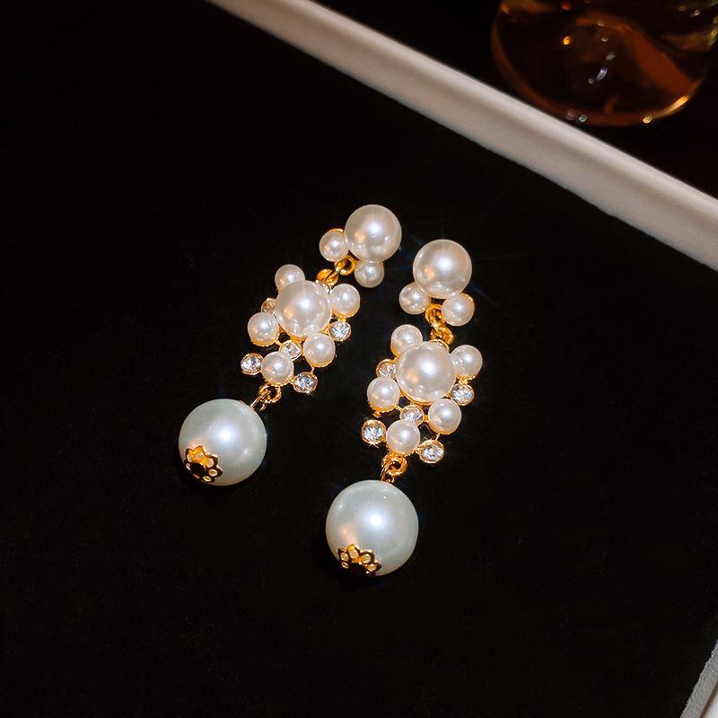 

Серьги-кисточки с инкрустацией стразами и жемчугом для женщин 2025 Новые Высококлассные Модные Универсальные Висячие Серьги Роскошный Дизайнерский Циркон