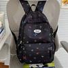 Colorful Doodle Print School Backpack with Multiple Front Pockets Adjustable Straps Casual Daypack for Teens