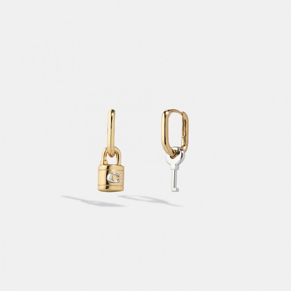 

Серьги с замком и несоответствием ключей с подписью Coach