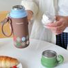 Isolierter Reisebecher mit Tragegurt und Strohhalm für Büro und Außenbereich