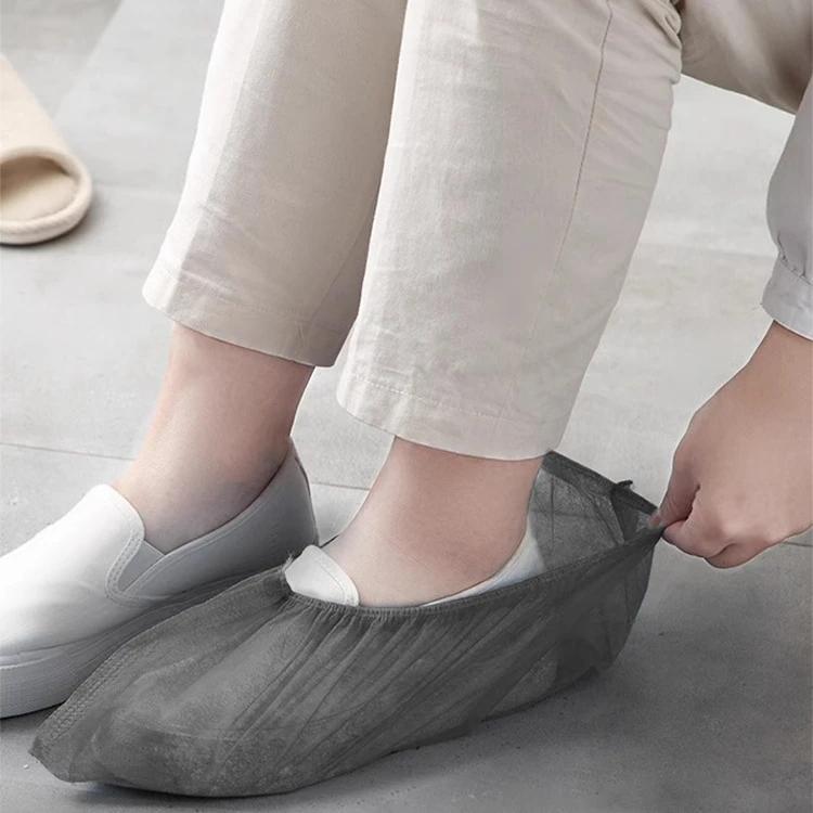 100 Einweg-Schuhüberzieher Haushalt Innen Verdickt Widerstandsfähiges Gewebe Wiederholt Verwendbar Wasserdicht und Rutschfest Spezieller Fußschutz