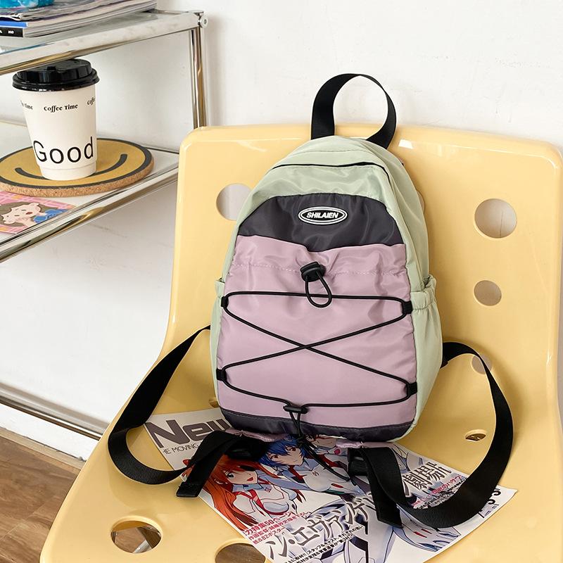 Outdoor travel bag mini fashion small backpack new Korean light boys and girls backpack junior high school hiking bag