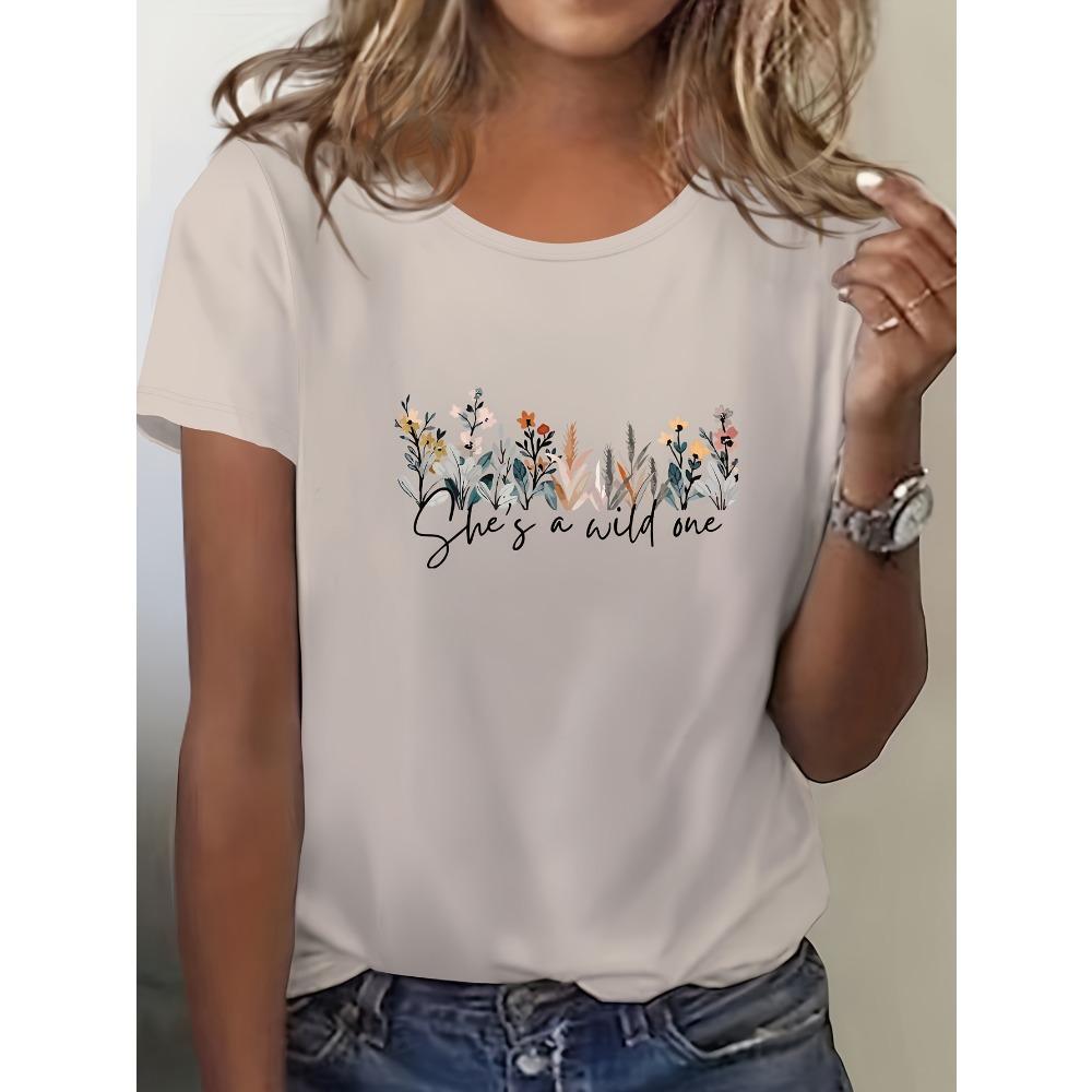 Women's Casual Short Sleeved Round Neck T-shirt with Vibrant Blue Floral Print Featuring "She's Wild At Heart" Reference To Women's T-shirt