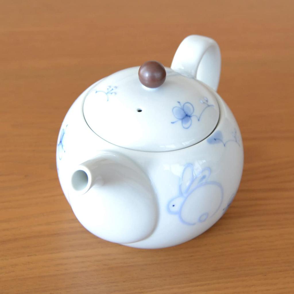 Stylish stainless steel teapot with tea made in Japan featuring a unique floral rabbit design built-in strainer, (Arita ware/Hasami ware), (U-pot),