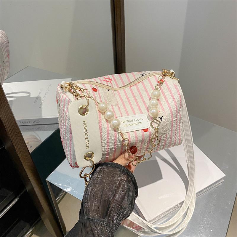 Exquisite high-end textured small bag 2025 summer new small fresh powder grid pillow bag versatile messenger shoulder bag