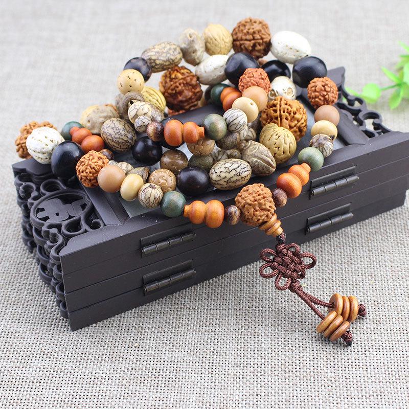 Creative Bodhi Seed Bracelet: 108 Beads for Meditation, featuring Eighteen Treasures, Star Moon, Vajra, and White Jade Bodhi.