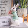 Easter Bunny Holding Egg Resin Sculpture Decorative Figurine for Home Bedroom, Living Room, and Holiday Atmosphere Decoration